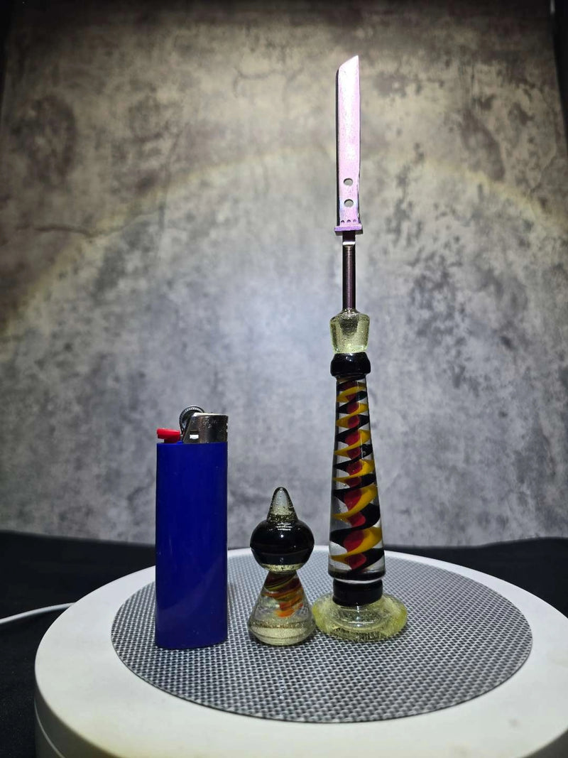 Titanium Dabber with anodized pink blade